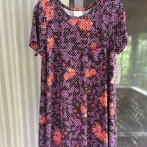 Pink, purple, and black small LuLaRoe Carly